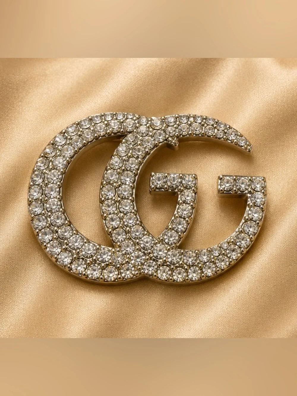 Gold Tone Rhinestone Interlocking Letter Statement Brooch Pin